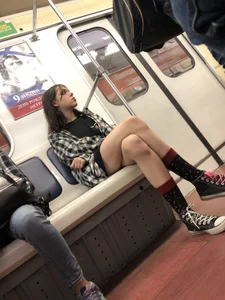 Cute Skinny Teen in Knee-Socks And Shorts Sitting With Crossed Legs in a Subway Train Creepshots Gallery