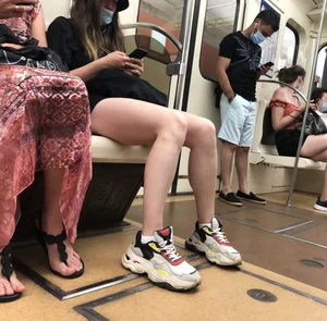 Hot Girl in a Mask And a Hat With Long Sexy Legs Subway Train Creepshots Gallery