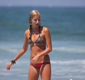 Candid surfer babes on the beach and in bikinis