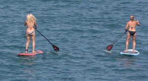 Candid surfer babes on the beach and in bikinis