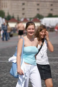 Big boobed girl in blue top with no bra playing in the water