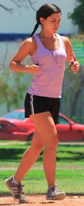 Hot brunette running in short shorts with vpl