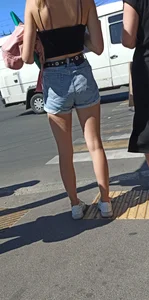 Hot Candid Girl in a Top and Denim Shorts on a Crosswalk Creepshots - Amazing Skinny Legs