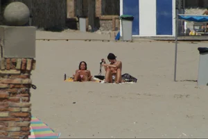 Girls on a nude beach in Sitges, Spain