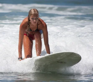 Candid surfer babes on the beach and in bikinis