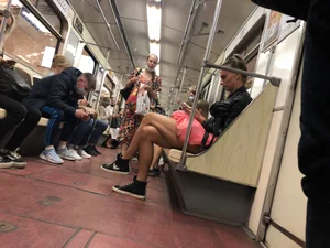 Hot Milf in Mini Shorts on the Subway Escalator and in the Train Candid Gallery