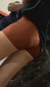 Skinny with hot ass in brown shorts