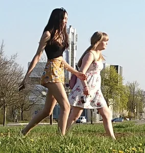 Talking to two cute candid German girls in shorts