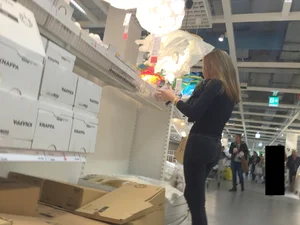 Skinny girl shopping in tight black jeans