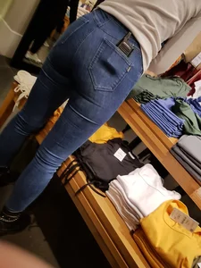Sexy clothing store employee with a nice ass in tight jeans