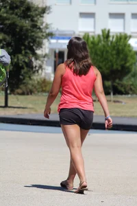 Thick girl in pink top and black shorts with vpl