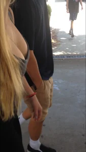 Blonde girl's boobs street closeup pic - hot girl passing by