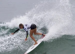 Candid surfer babes on the beach and in bikinis