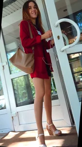 Cute Girl in Red Dress with Long Thin Legs on Heels City Candid