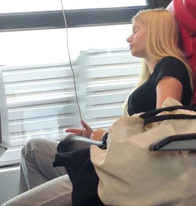 Hot busty blonde on train