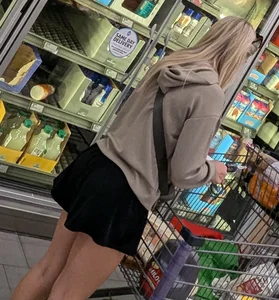 Cute petite wife with nice legs at the market (face)