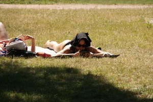 Creepshots of some girls in the park getting some sun in bikinis