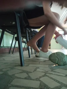 College teen girls changing shoes