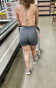 Tiny Latina in tight spandex shorts