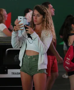 Cheeky sexy babe tourist out in tiny green jean shorts