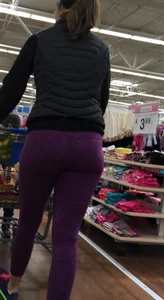Milf shopping with a nice ass in purple leggings