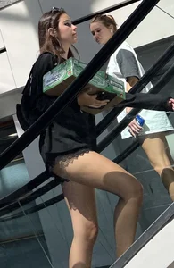 Beautiful brunette college girlwith sexy legs