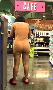 Latina with hard nipples and a big booty in tight spandex shorts outfit
