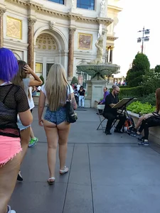 Big booty blonde showing a ton of her ass cheeks in shorts