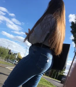 Long haired beauty teen with a tight ass in jeans