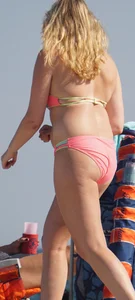 Thick blonde bikini babe on the beach