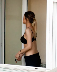 Hot neighbor on the patio in her bra with nice tits