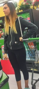 Sexy girl grocery shopping in skin tight leggings with great ass
