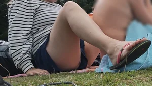 Mom at a lake with a glimpse of panties
