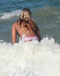 Hot surfer chicks out in the water