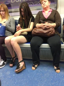 Hot Girl With Gorgeous Legs in a Dress and High Heeled Sandals in a Subway Train And on a Street