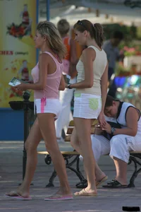 A bunch of sexy beach voyeur babes in bikinis, thongs and topless