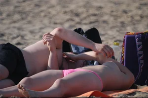 Girls on a nude beach in Bibione, Italy