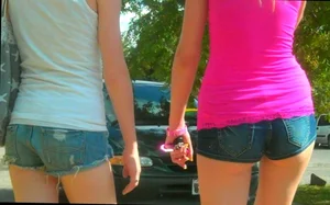 Skinny babe in denim shorts with a nice gap showing ass cheeks