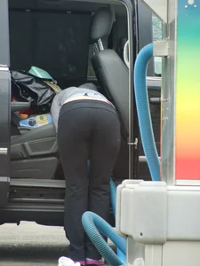 Girls cleaning their cars in jeans and pants