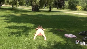 Sunbathing at park in panties and bra