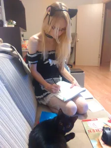 Cute Skinny Girl in a Dress on a Couch Home Candid