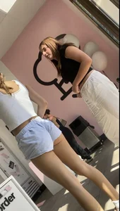 Blonde With Ass Hanging Out the Shorts