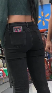 Tight green top and blk jeans at the market