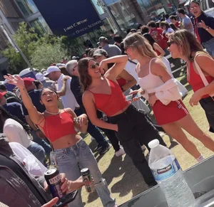 Hot college girls at football game (cheeks everywhere)