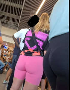 Hot airport girl wearing pink tight short