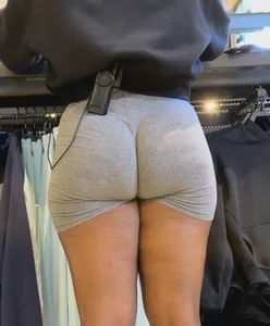 Nike employee in grey shorts with a massive wedgie