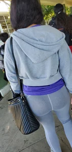 Latina cutie with a round ass in grey leggings