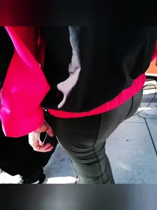 Ass in leather pants closeups on the street