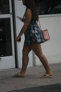 Thick girl in romper shorts going into TJ Maxx gives a cheek peak