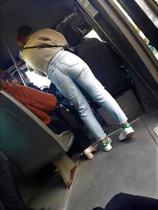 Lovely ass girl in jeans in public transport